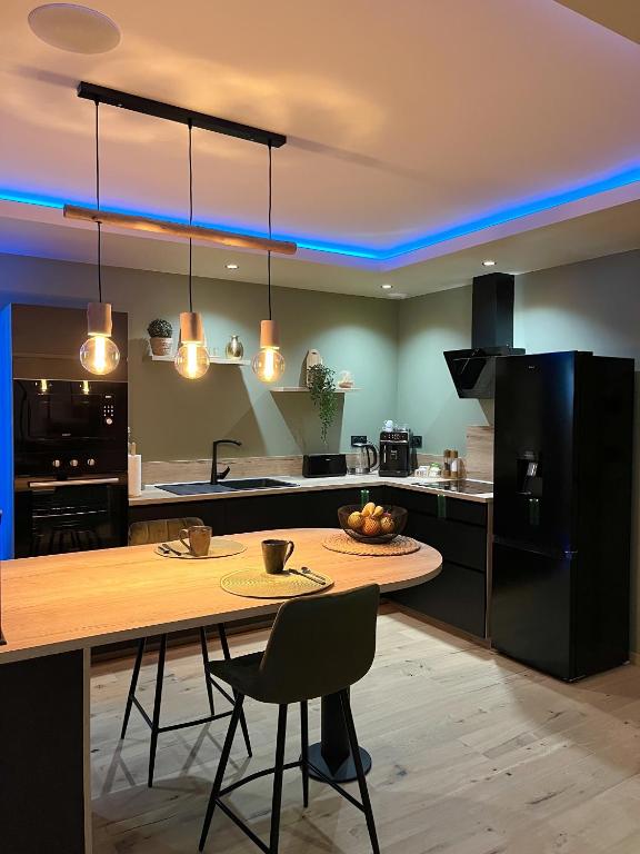 Coin repas & Cuisine équipée - L'Apogée