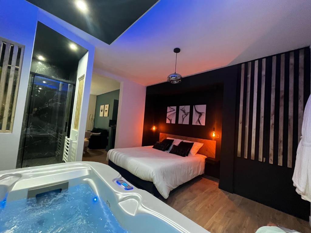 CK Suite & Spa à Reims avec jacuzzi privatif - Chambre romantique pour couple