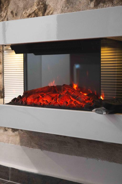 Cheminée d'ambiance - La Reine d'Orel