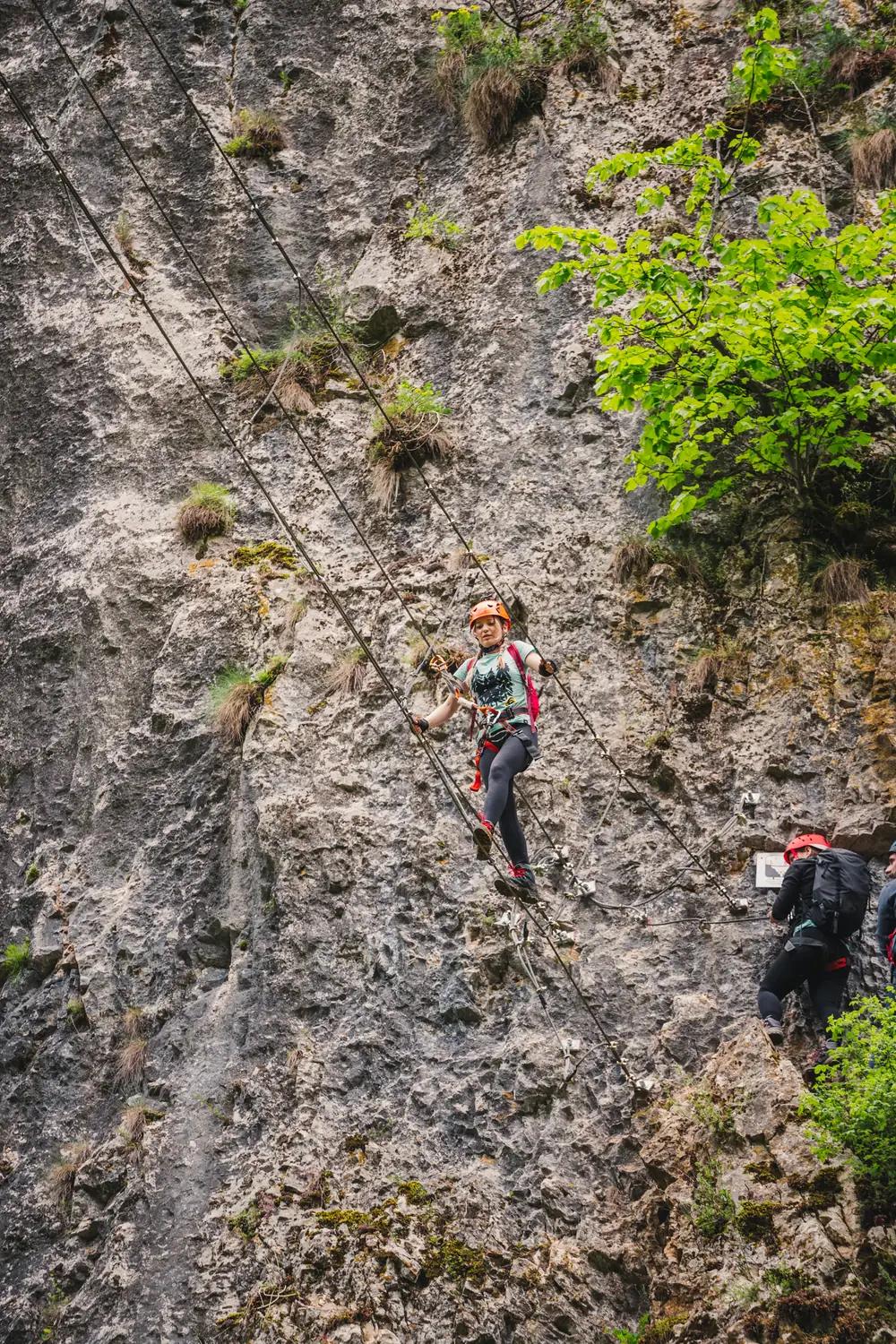 Two climbers on the via ferrata route in the Crișul Repede Gorge