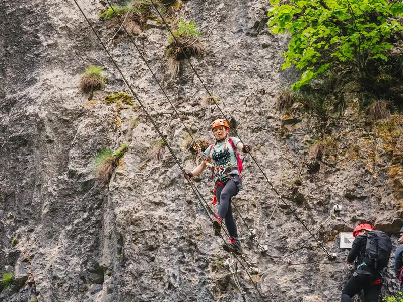 The route is done in pairs, with a guide Two climbers on the via ferrata route in the Crișul Repede Gorge