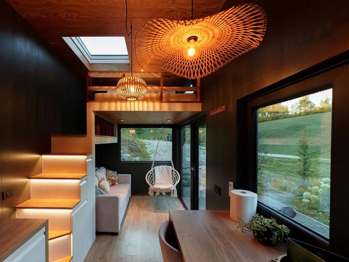 Eco-luxury interior with panoramic window – Cappuccino Eco-luxury interior with panoramic forest window at Cappuccino