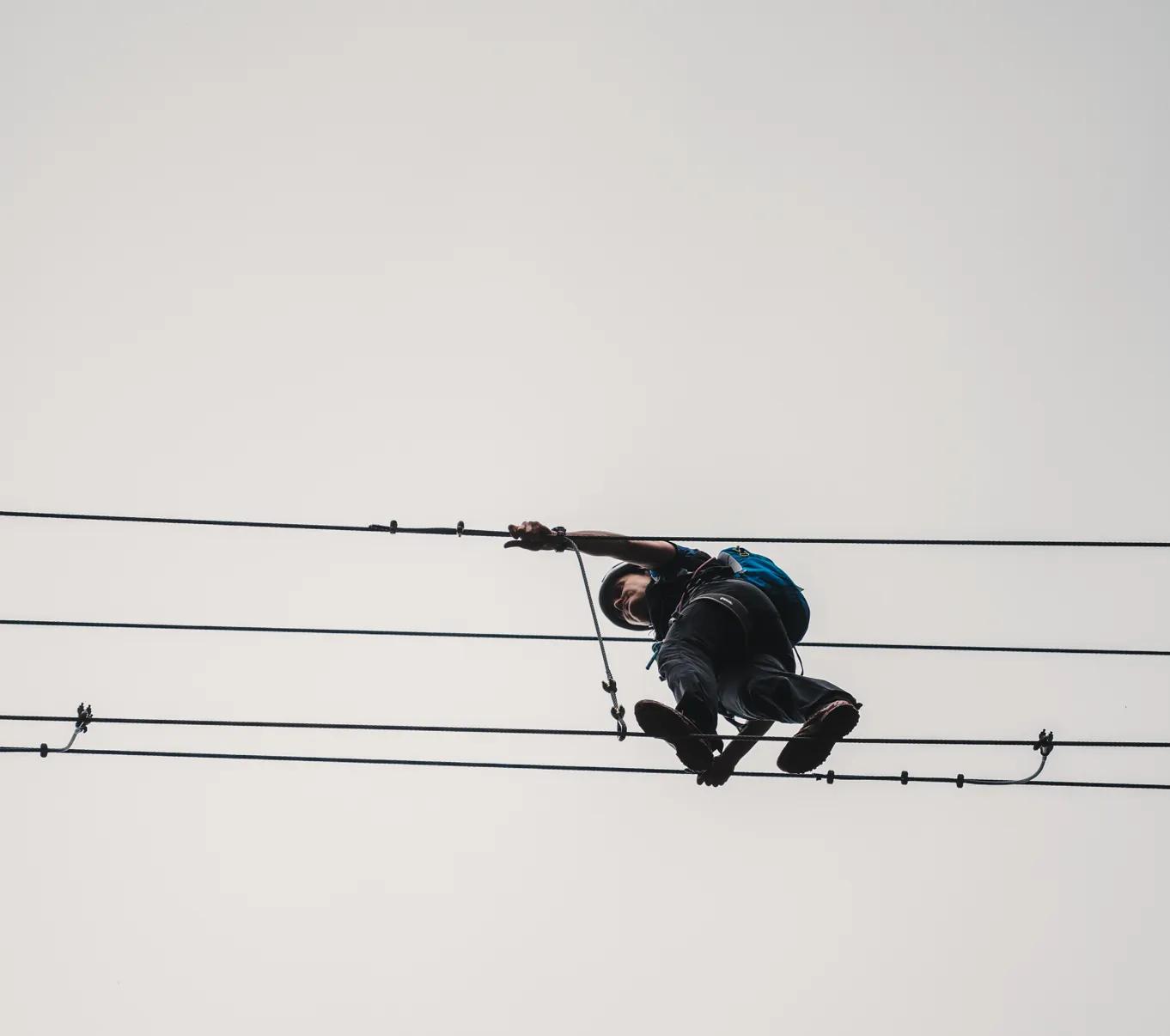 A suspended cable bridge on the via ferrata route near Șuncuiuș