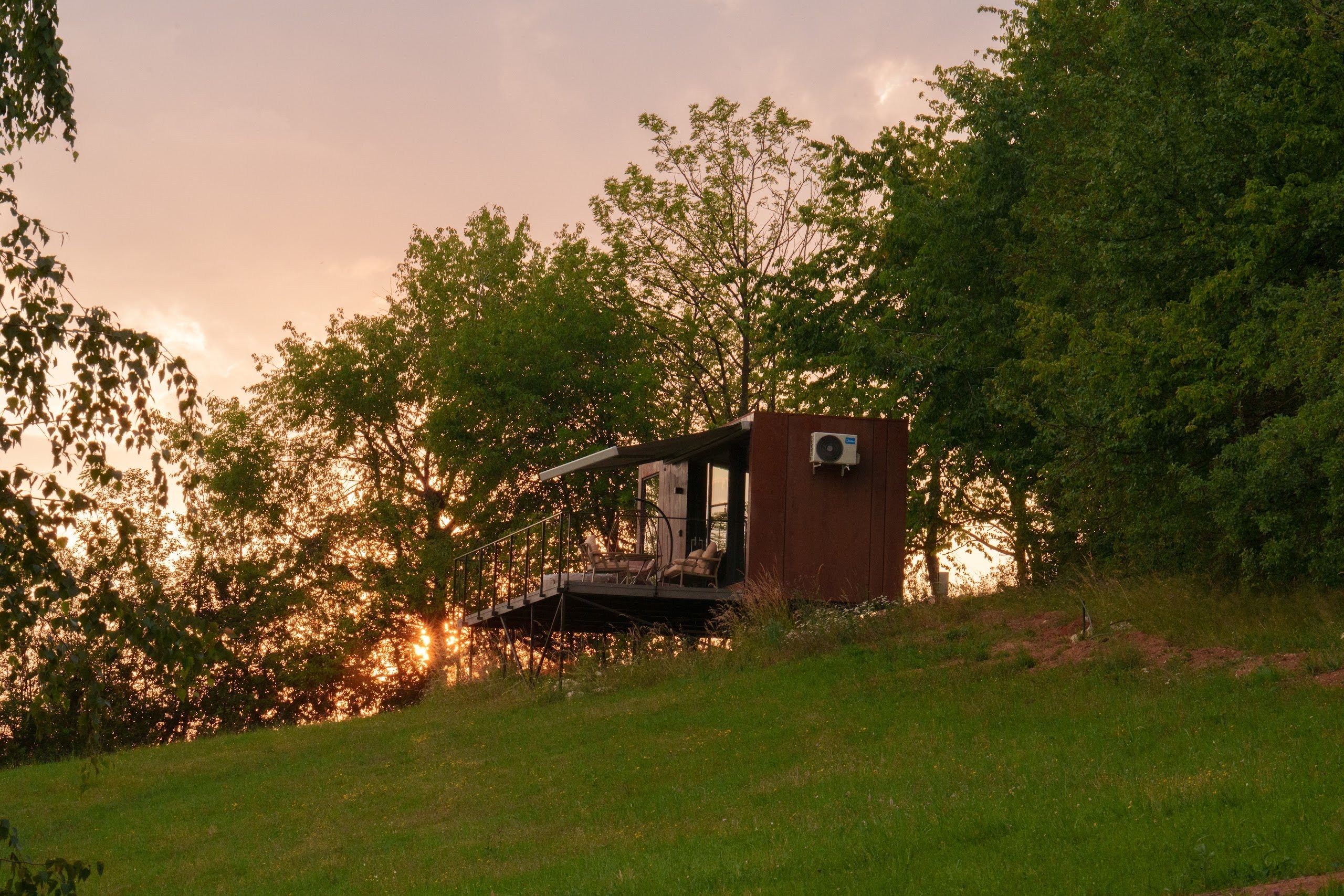 The Tiramisu tiny house at sunset in the Apuseni Mountains, Coniferis Retreat