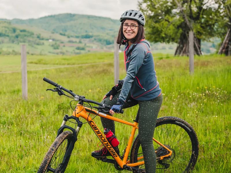 E-bikes make the climbs accessible to anyone Electric bike on a meadow in the Pădurea Craiului Mountains