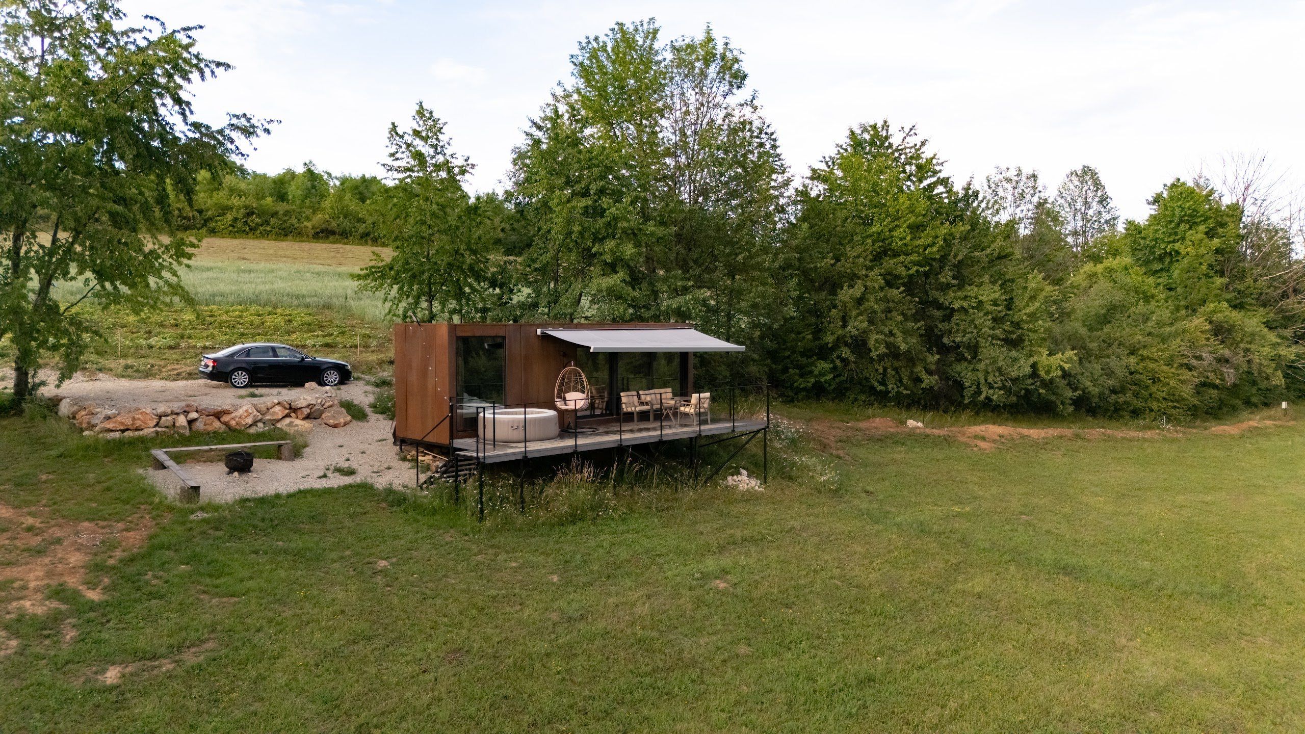 Aerial view of the Tiramisu tiny house and the lavender field in the Apuseni Mountains