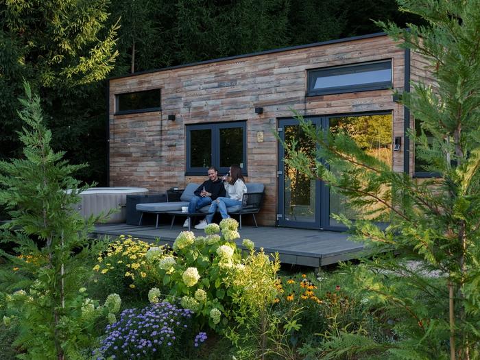 Exterior in summer – Cappuccino Exterior of Cappuccino cabin in summer, among the fir trees of Bihor