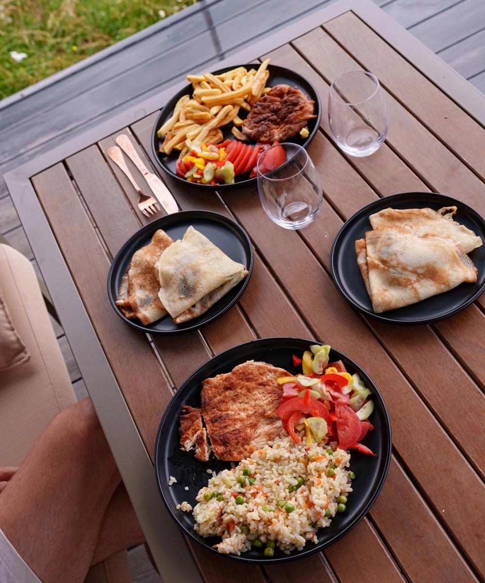 Home-cooked dishes Home-cooked dishes served on the terrace table at Coniferis Retreat
