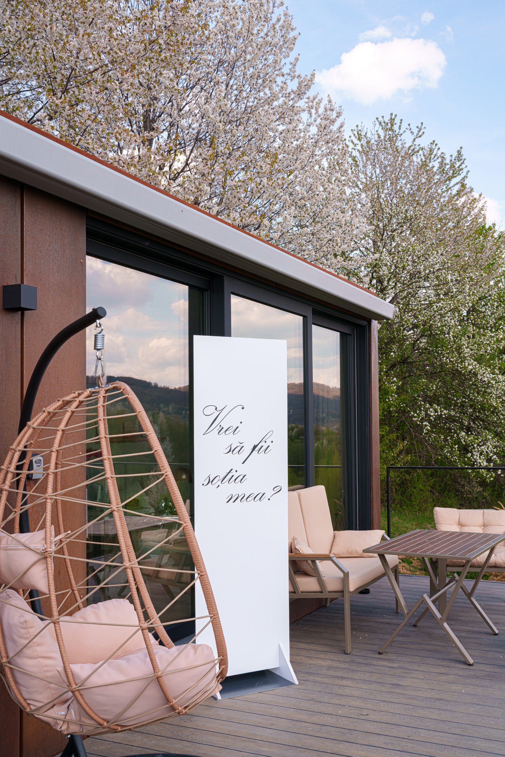 Marriage proposal on the terrace of a tiny house at Coniferis Retreat