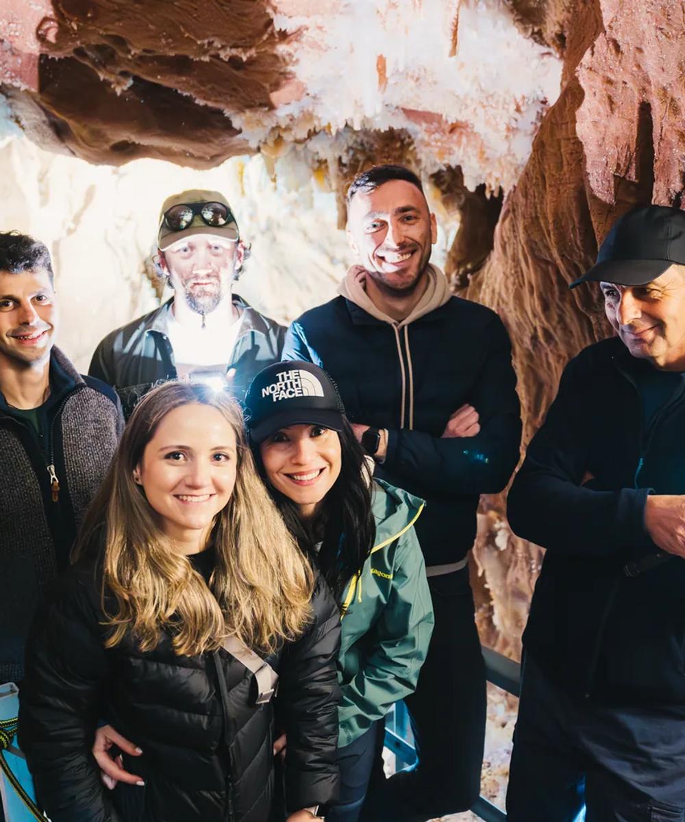 Caving – guided wild cave exploration A guided group inside a cave in the Pădurea Craiului Mountains