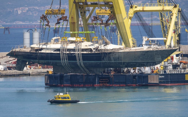 Superyacht lifted by crane.
