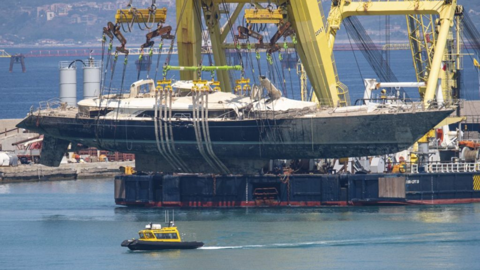 Superyacht lifted by crane.