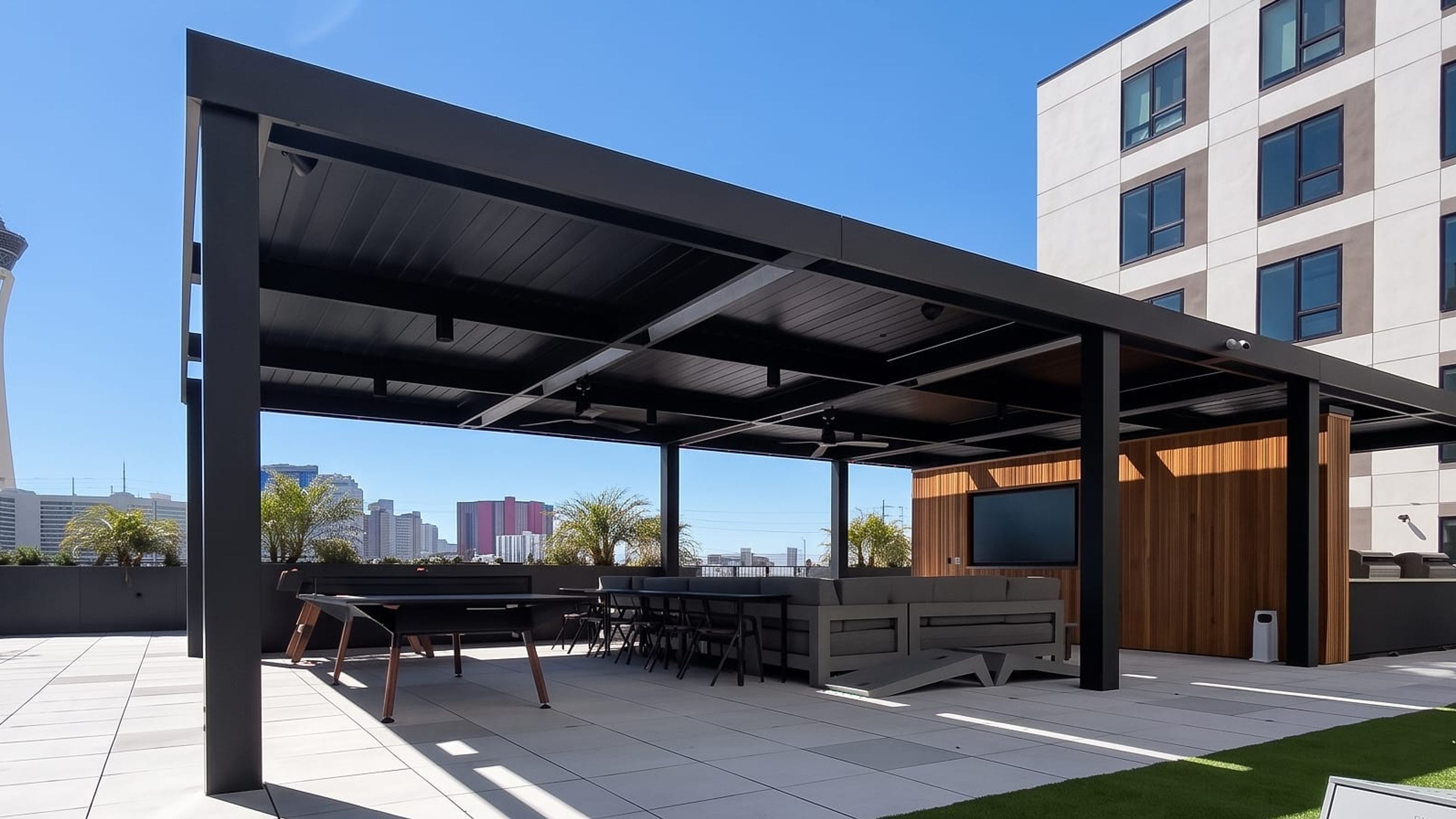 Black louvered roof over a rooftop lounge in the Las Vegas Arts District