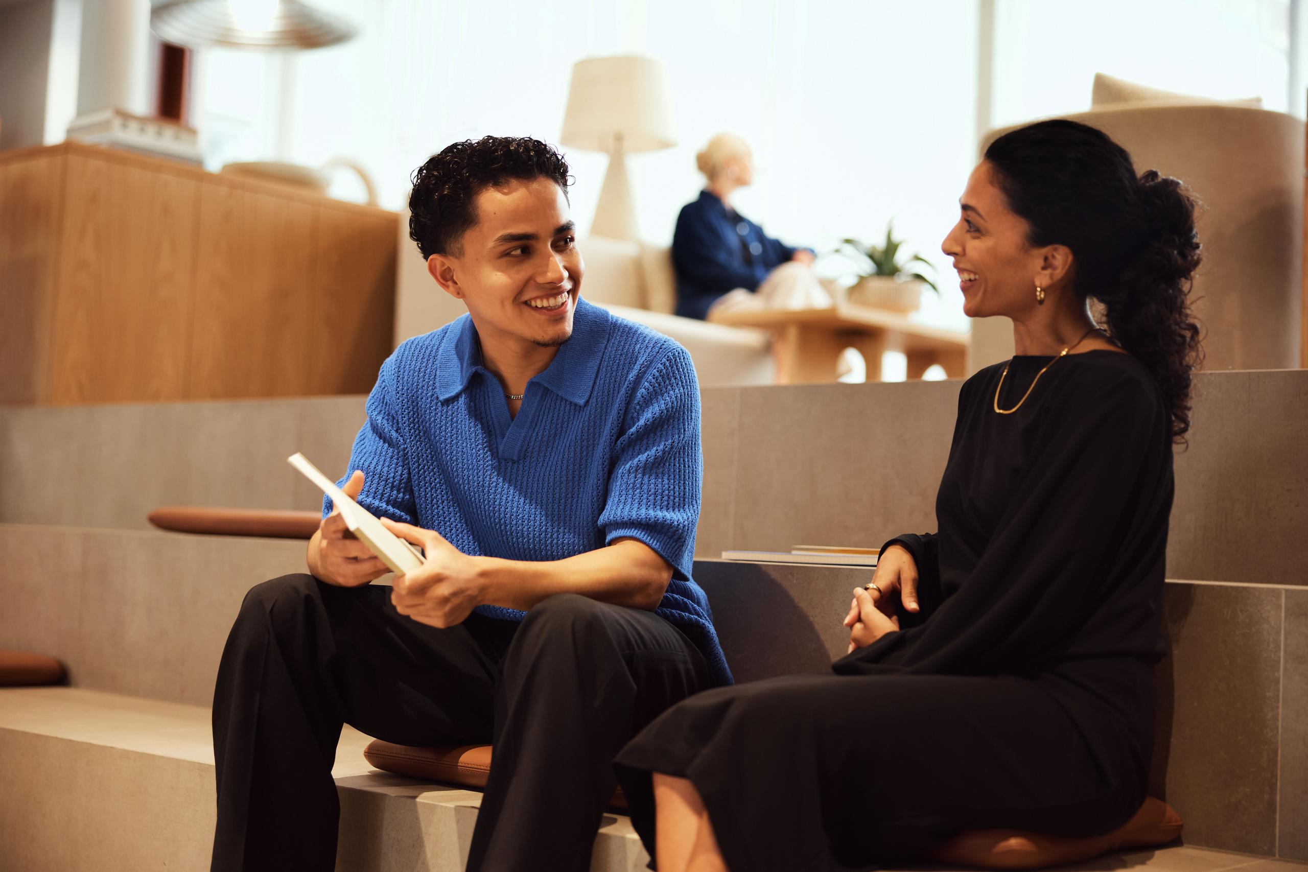 Two Multiverse employees having a meeting