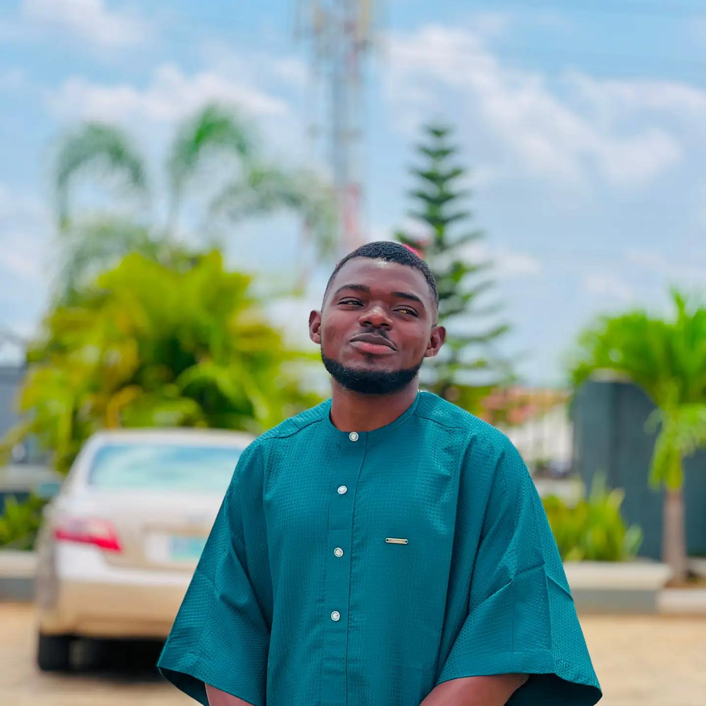 Adetunji Jacob Ogunyemi in traditional attire, photographed outdoors