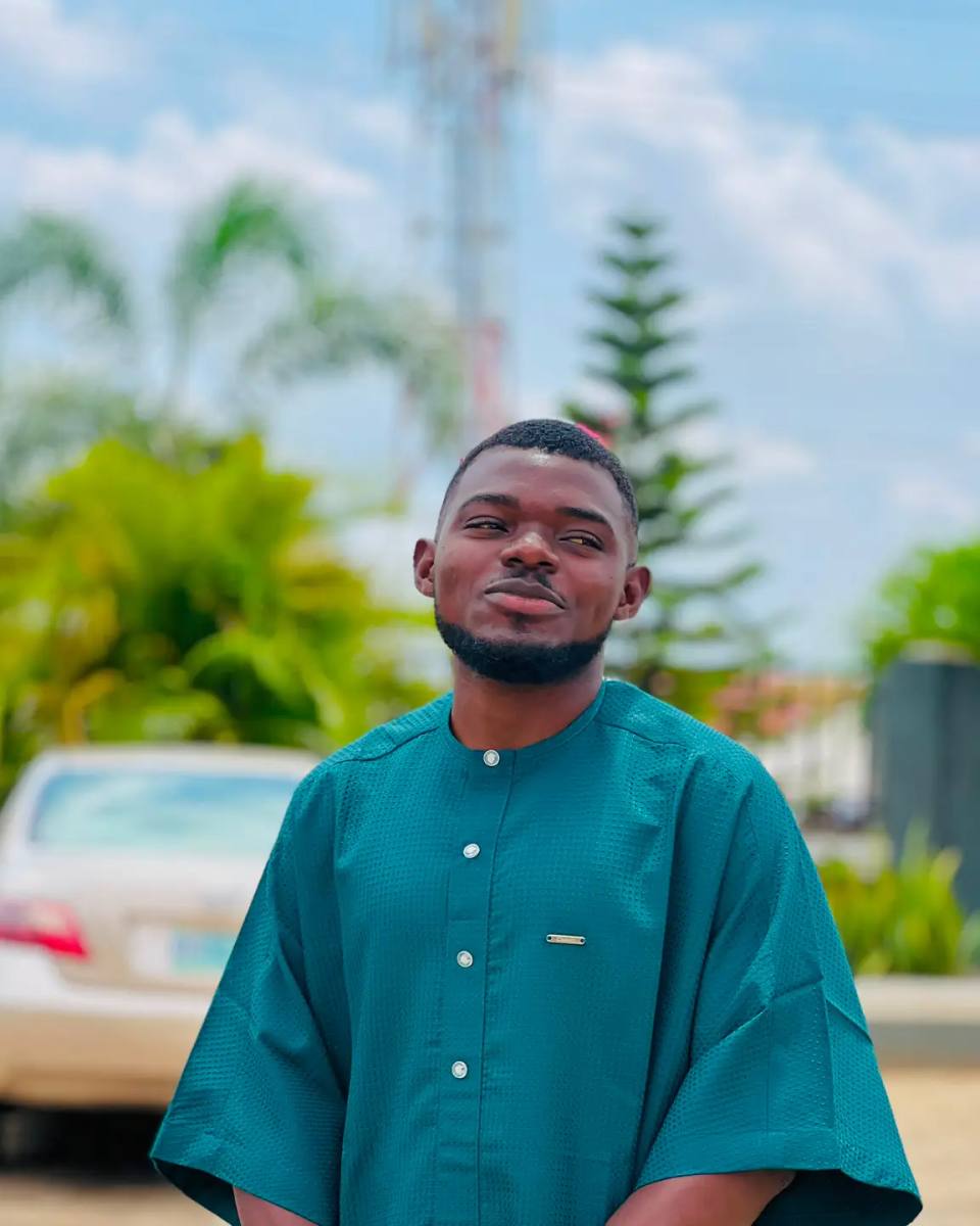 Adetunji Jacob Ogunyemi in traditional attire, photographed outdoors