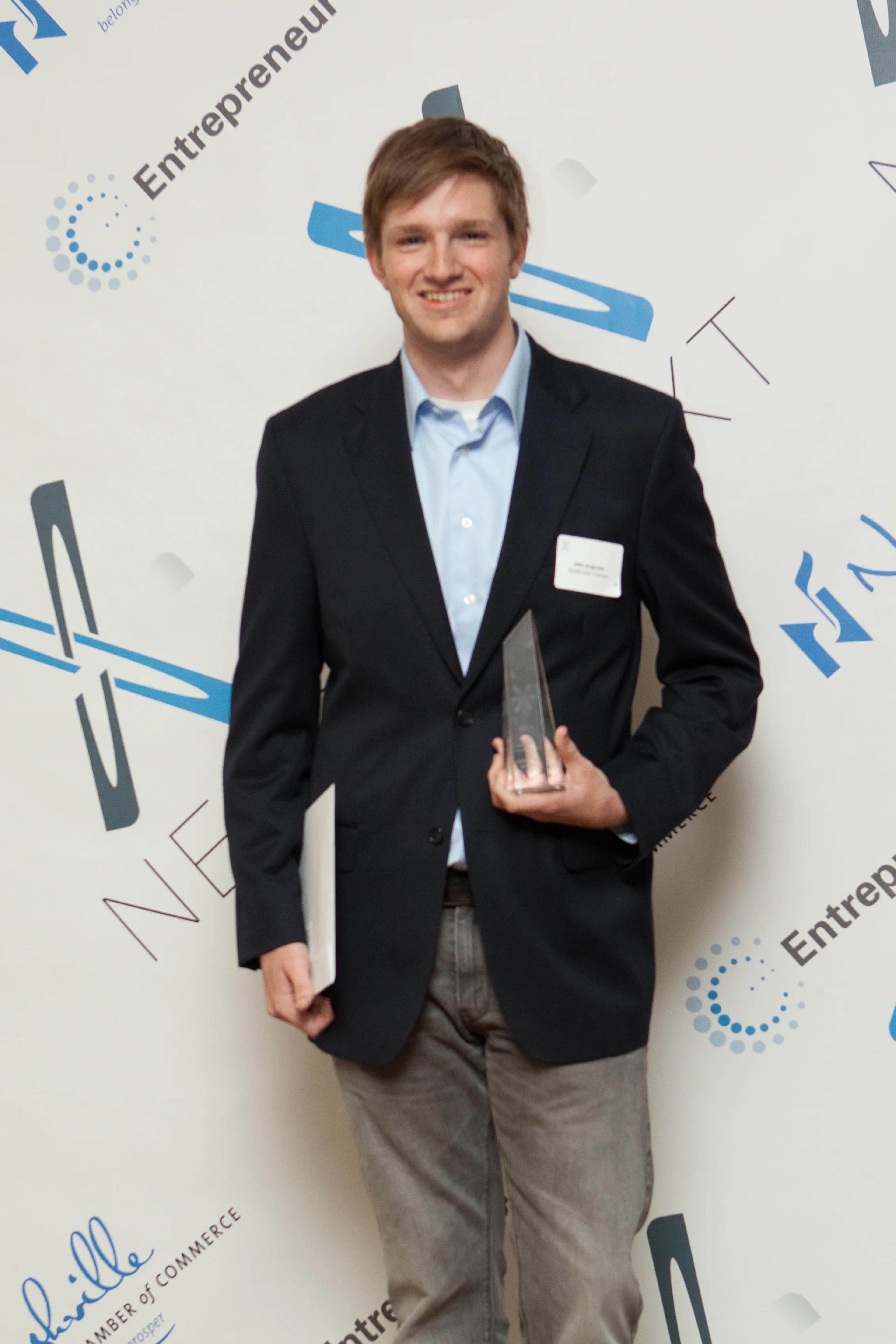 Accepting the award for Nashville Youth Entrepreneur of the Year. The smile on my face doesn't do justice to the stress I actually felt.&nbsp;