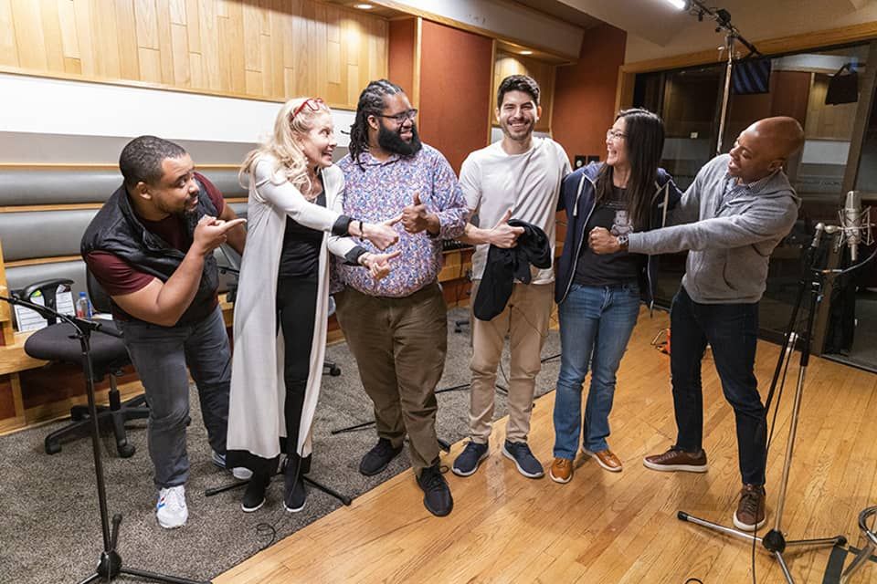 The Pitch podcast team recording session showing supportive startup investment environment with entrepreneurs and investors collaborating