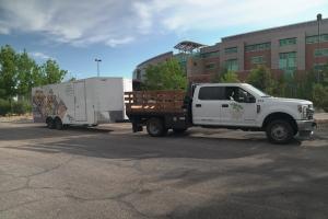 A Lindgren Landscape truck in front of a beautiful business campus