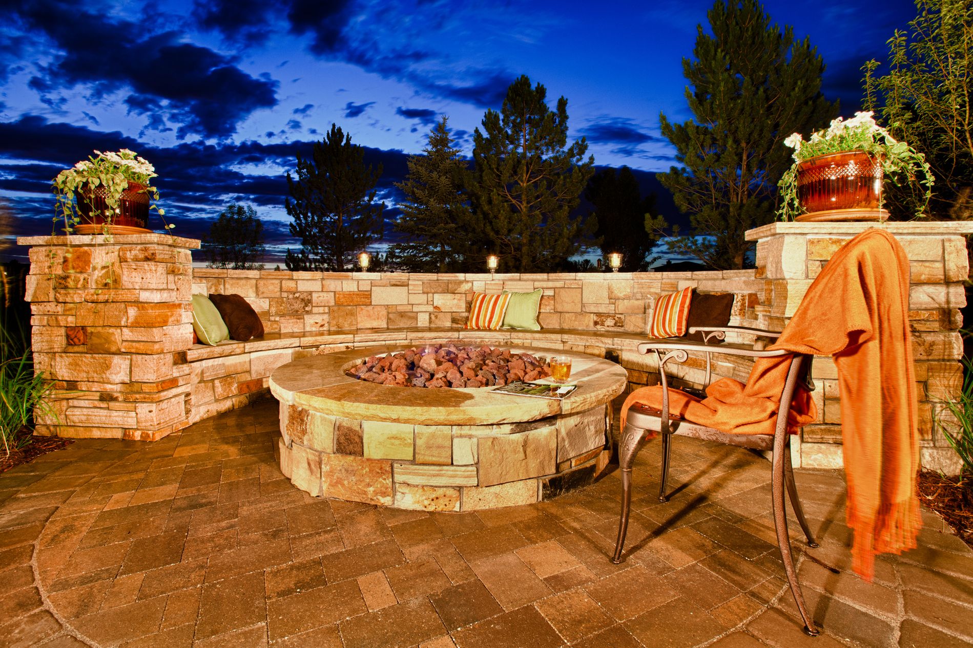Fire Pit at Night with Masonry Seating