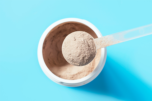 scoop of whey protein | creatine and protein