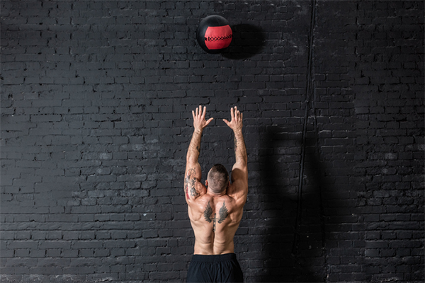 4 Wall Ball Exercises That Work Your Entire Body