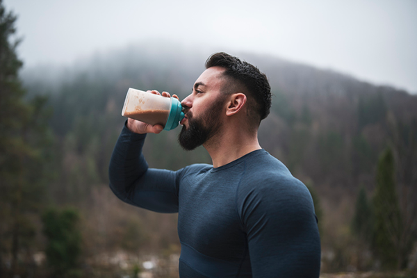 man drinking protein shake | what is nsf certified