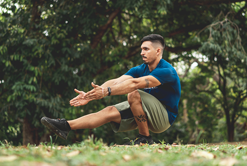 man doing pistol squat | muscle imbalance