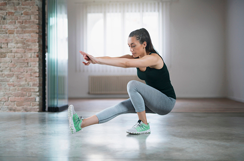 woman doing pistol squat | functional exercises