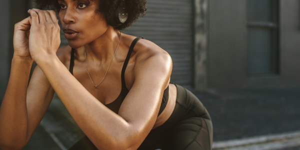 woman doing bodyweight squat | squat depth