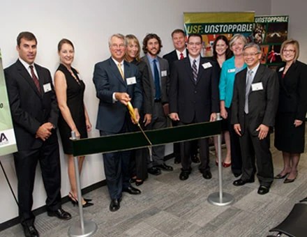 Group gathered for the USF Health ALS Clinic ribbon-cutting ceremony