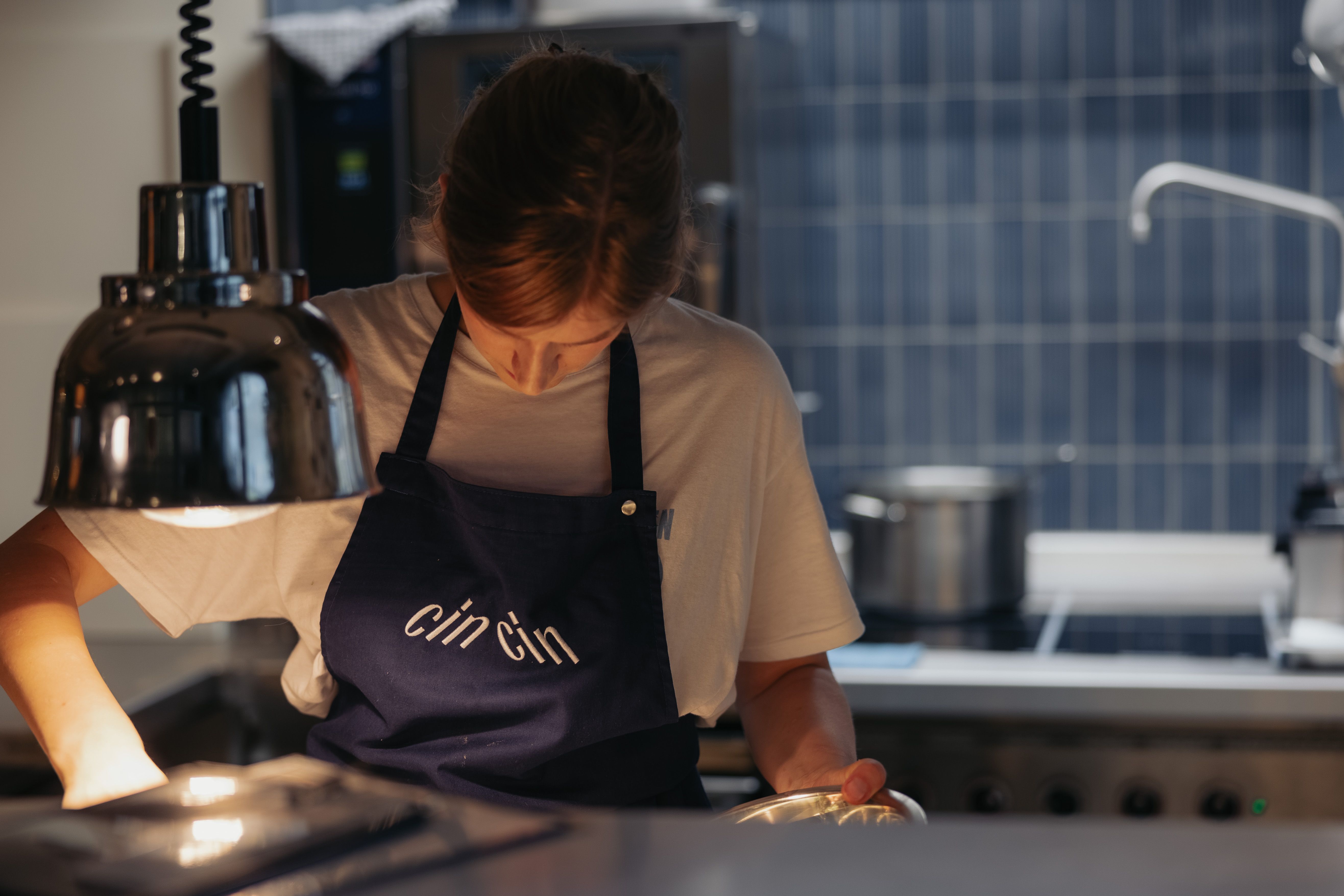 cin cin logo on workware working in the restaurant