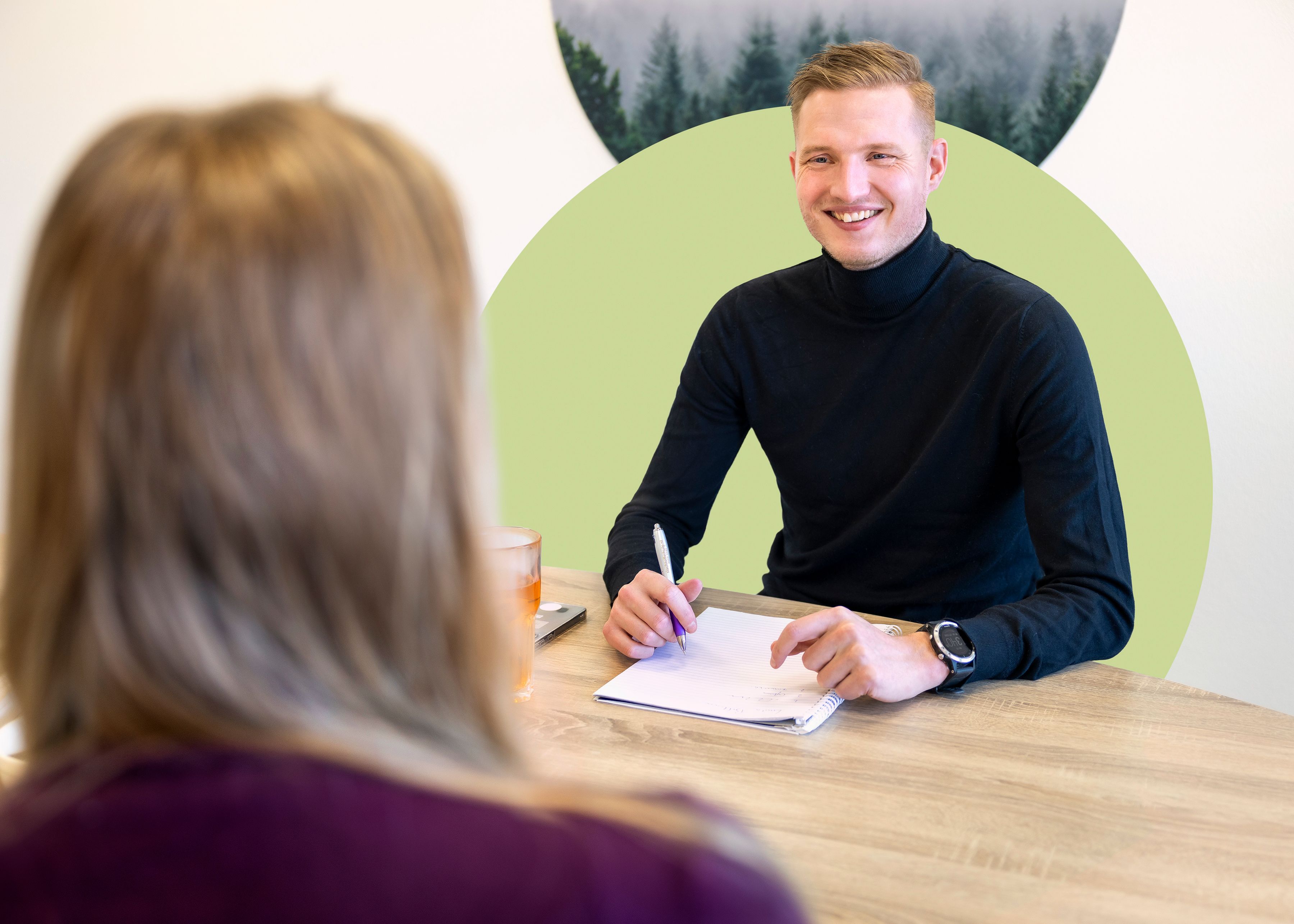 Foto van Alex op kantoor