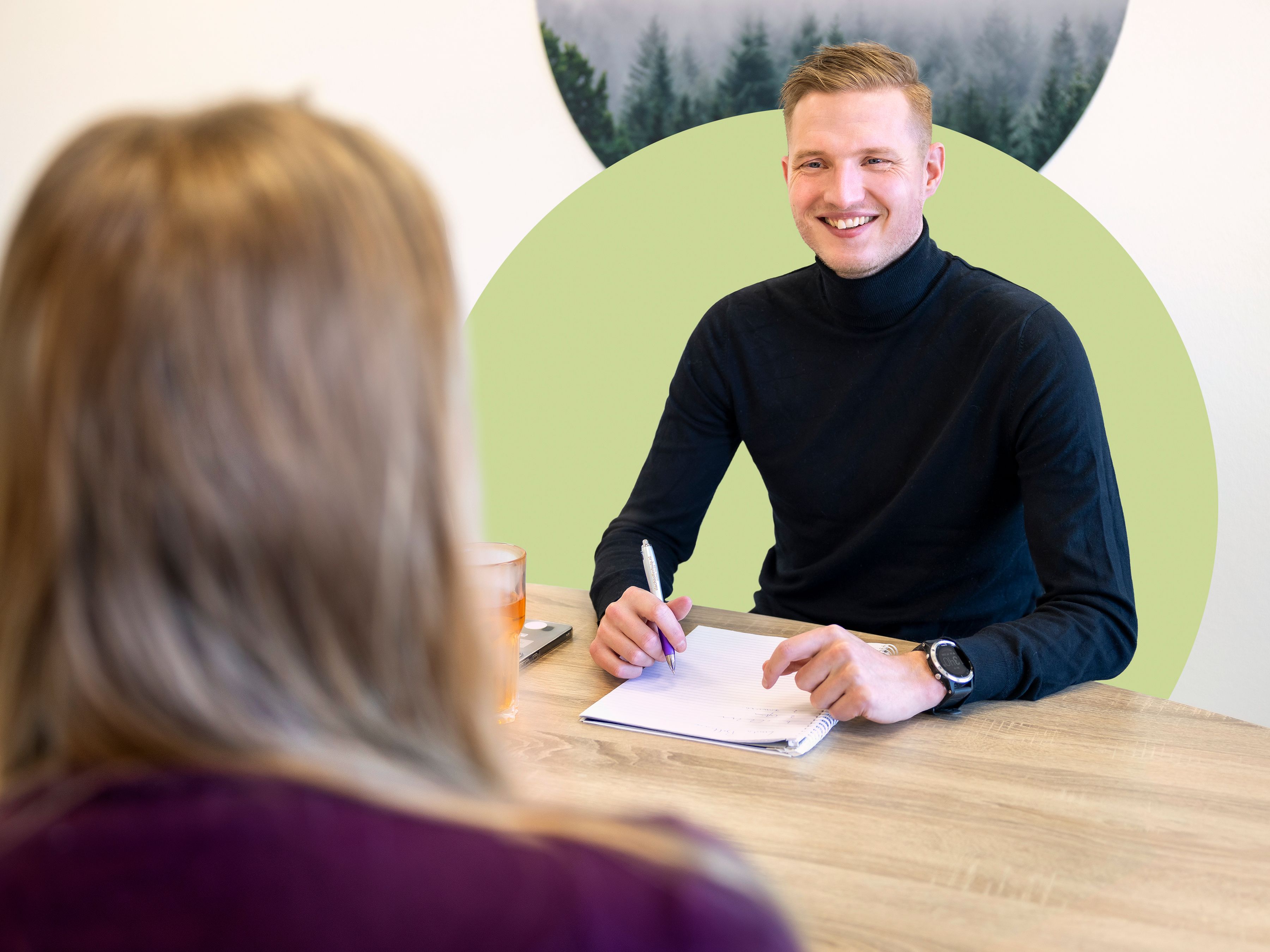 Foto van Alex op kantoor