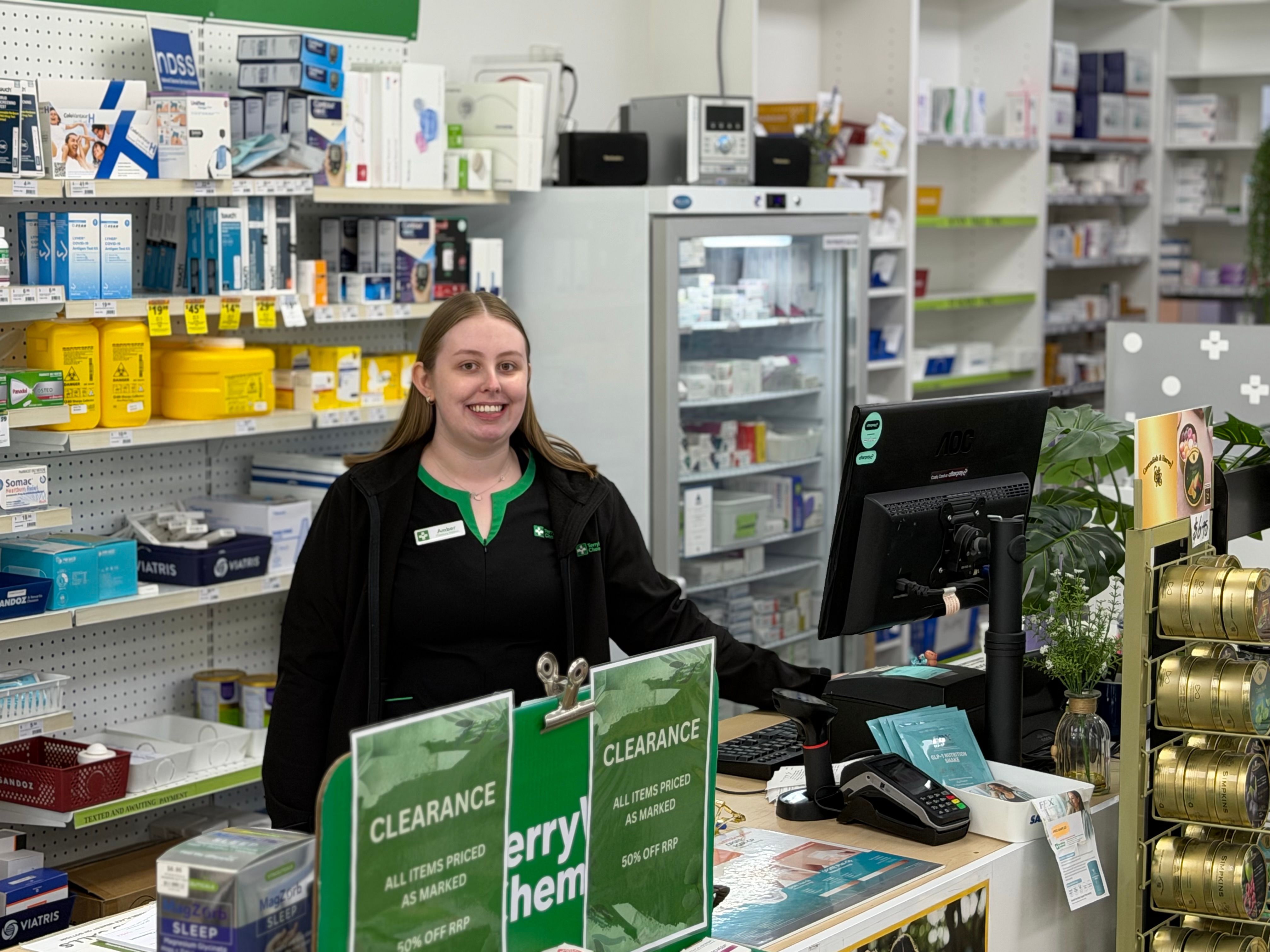 Staff member at the counter of TWCM Marden Compounding Pharmacy, a TerryWhite Chemmart franchise in Marden, South Australia.