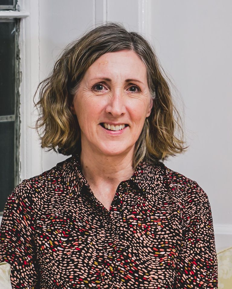 A smling picture of Wendy Barrett, Headmistress of Cobham Hall School.