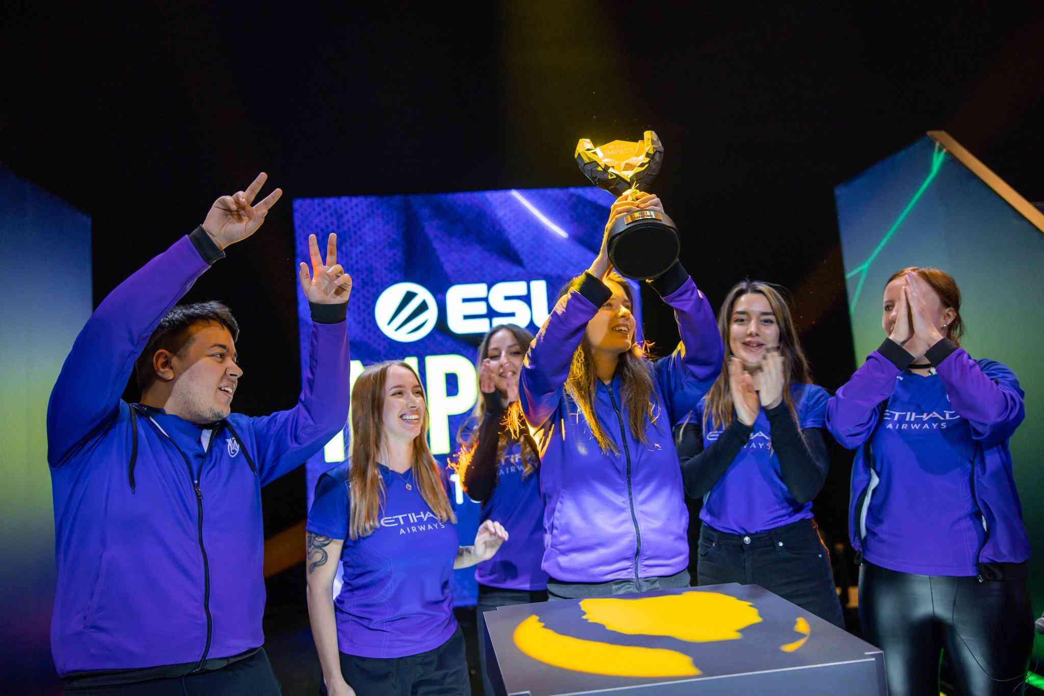 The roster for Nigma Galaxy pose with the trophy after a previous win at ESL Impact