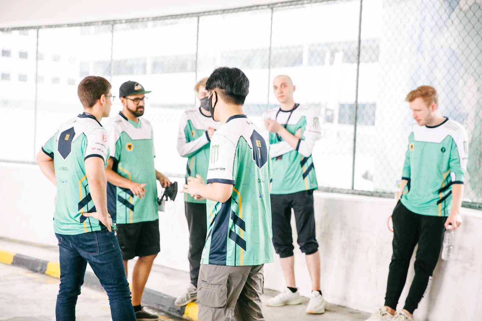 The former roster for Evil Geniuses gather for a photo in Singapore during TI 11