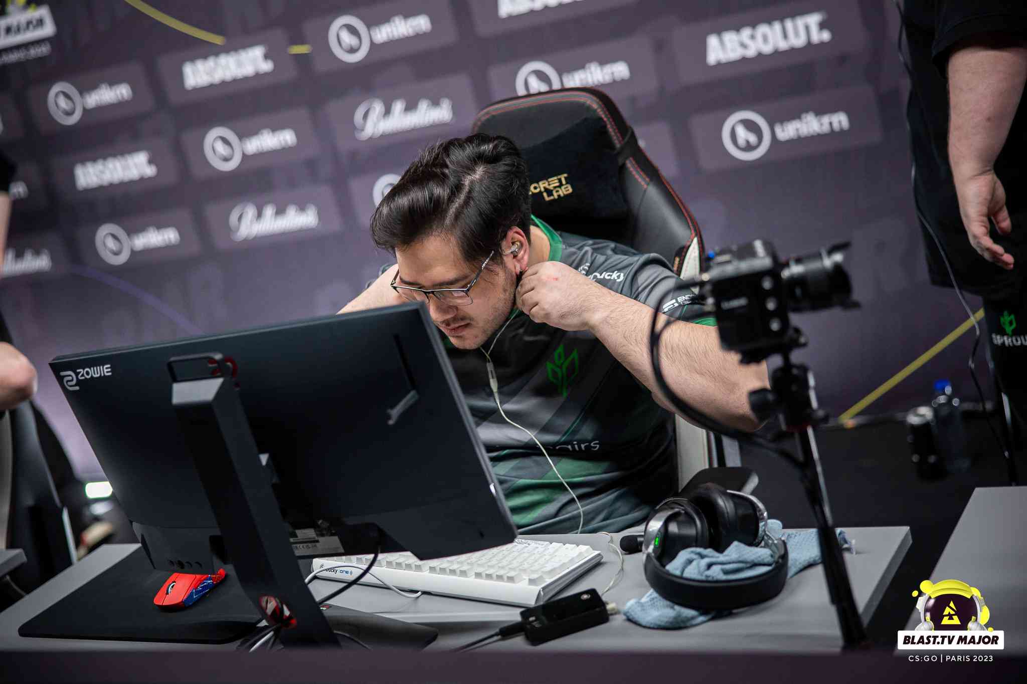 AZR puts on his headset ahead of the start of a match at the BLAST.tv Paris Major 2023: European RMR A