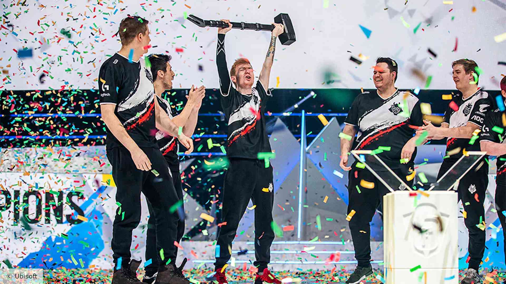 The 2019 iteration of G2's Rainbow Six roster celebrates with the trophy after winning the Six Invitational 2019 