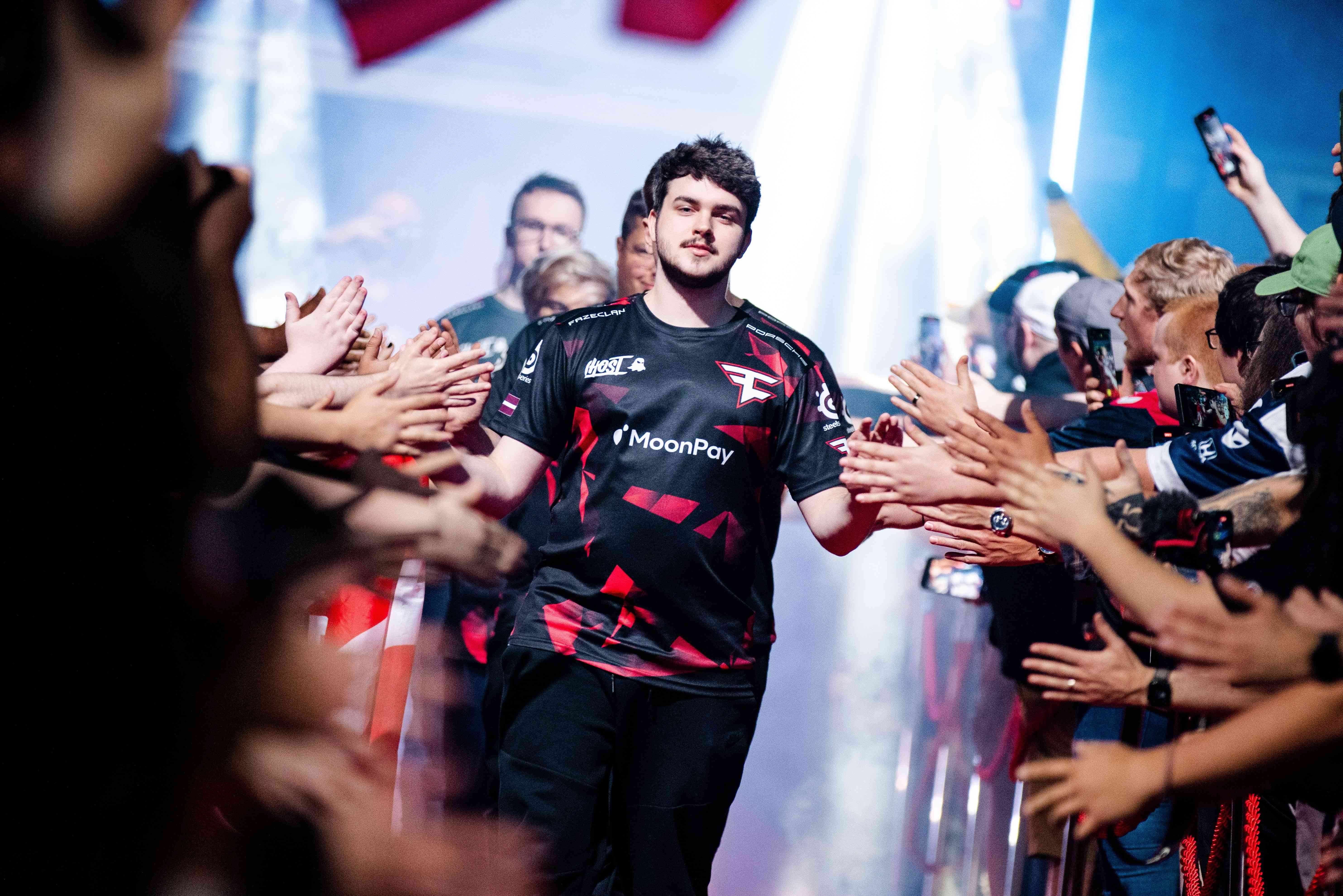 FaZe Clan’s Helvijs “broky” Saukants greets the fans as the team makes its way to the stage during IEM Dallas 2023