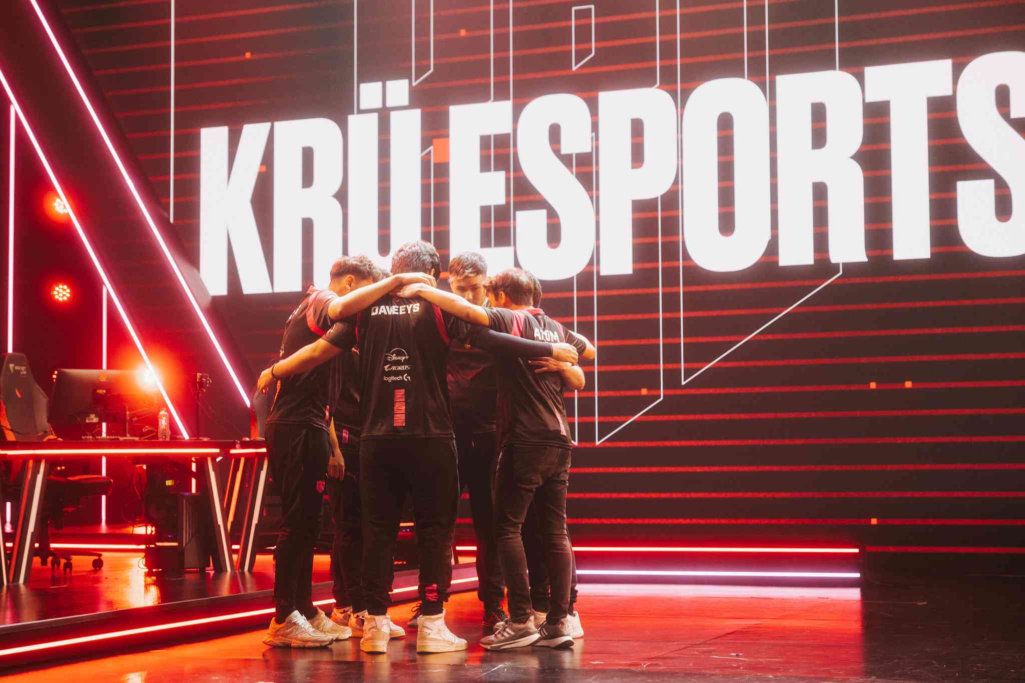 Members of KRU Esports huddle before their series against MIBR in Week 2 of the 2023 VCT Americas season (Credit: Tina Jo/Riot Games)