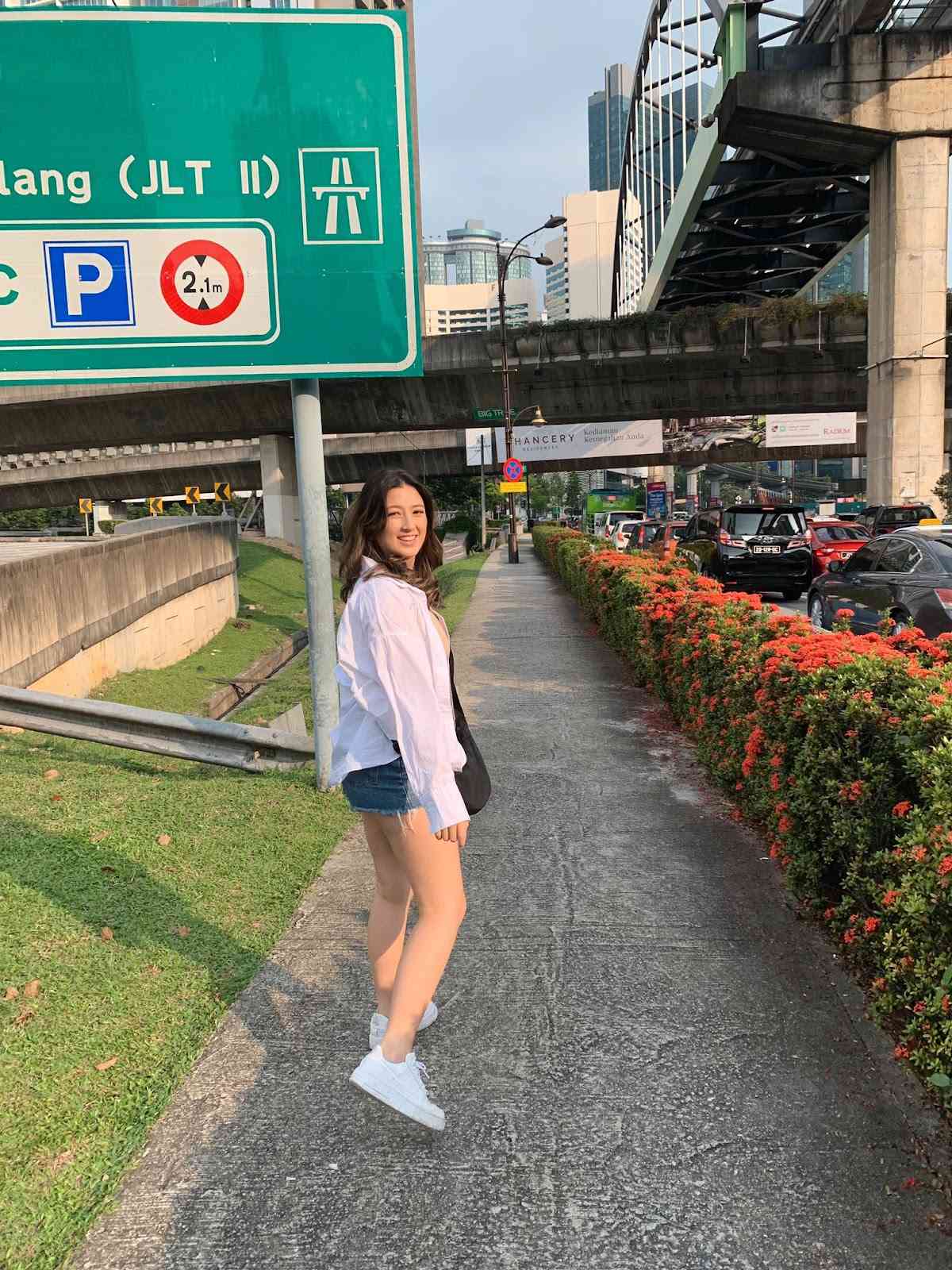 Sophia Mapua takes a walk around outside the stadium in Singapore during TI 11