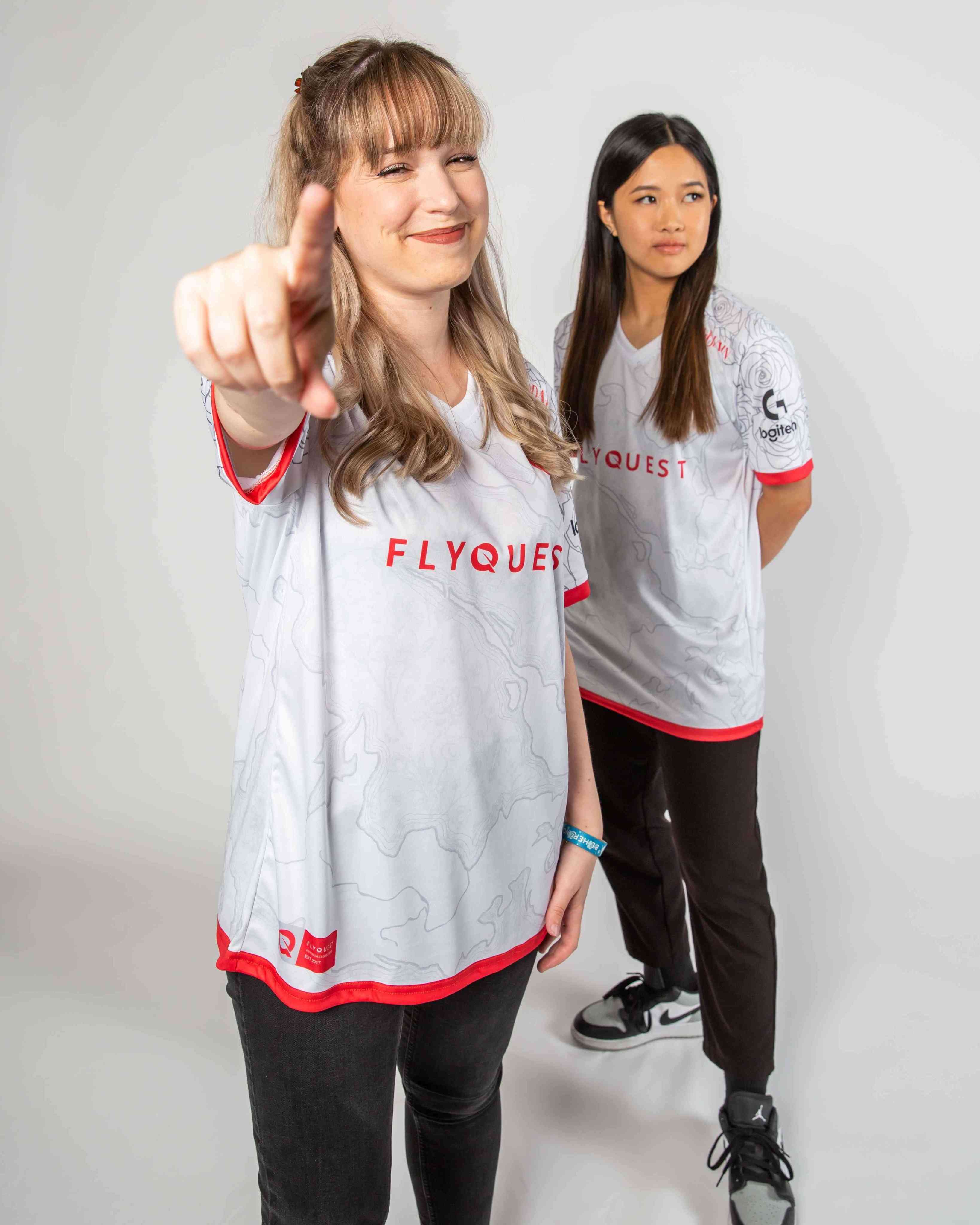 Two members of FlyQuest Red Posing