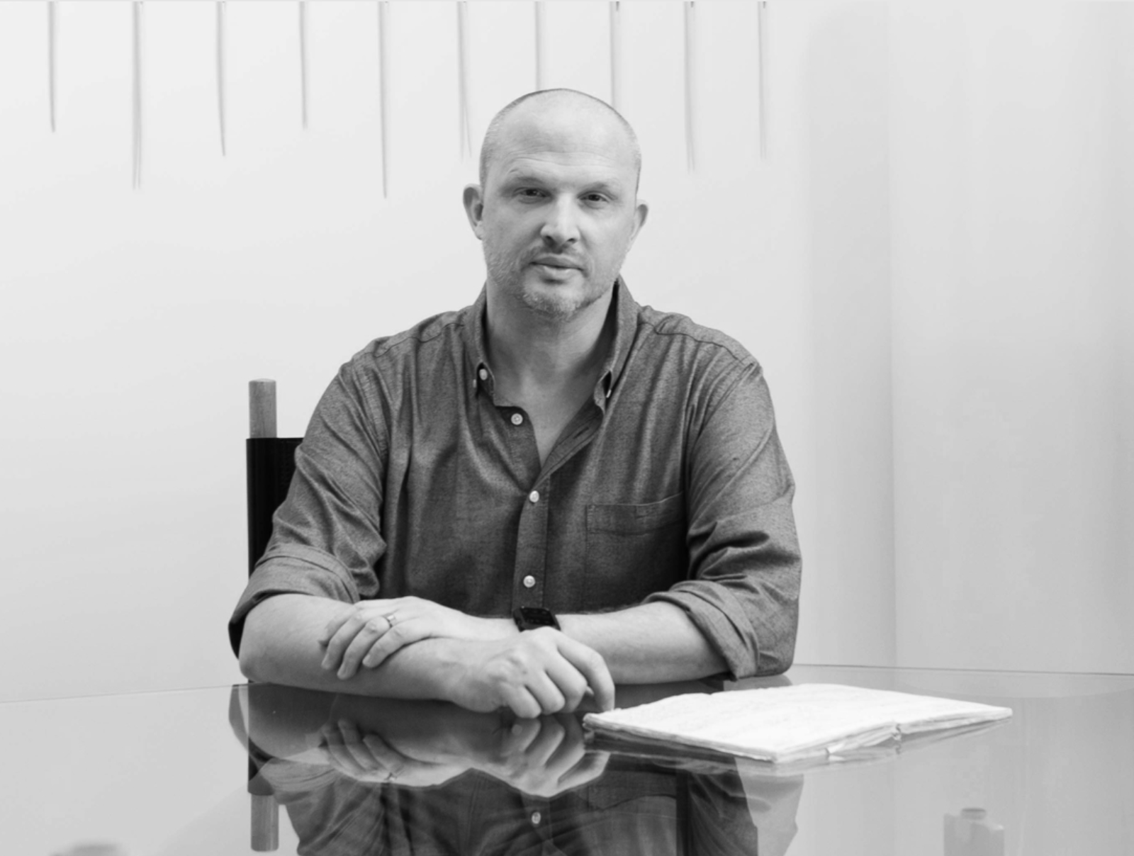 photo of a man on a desk 