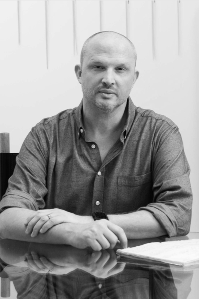 photo of a man on a desk