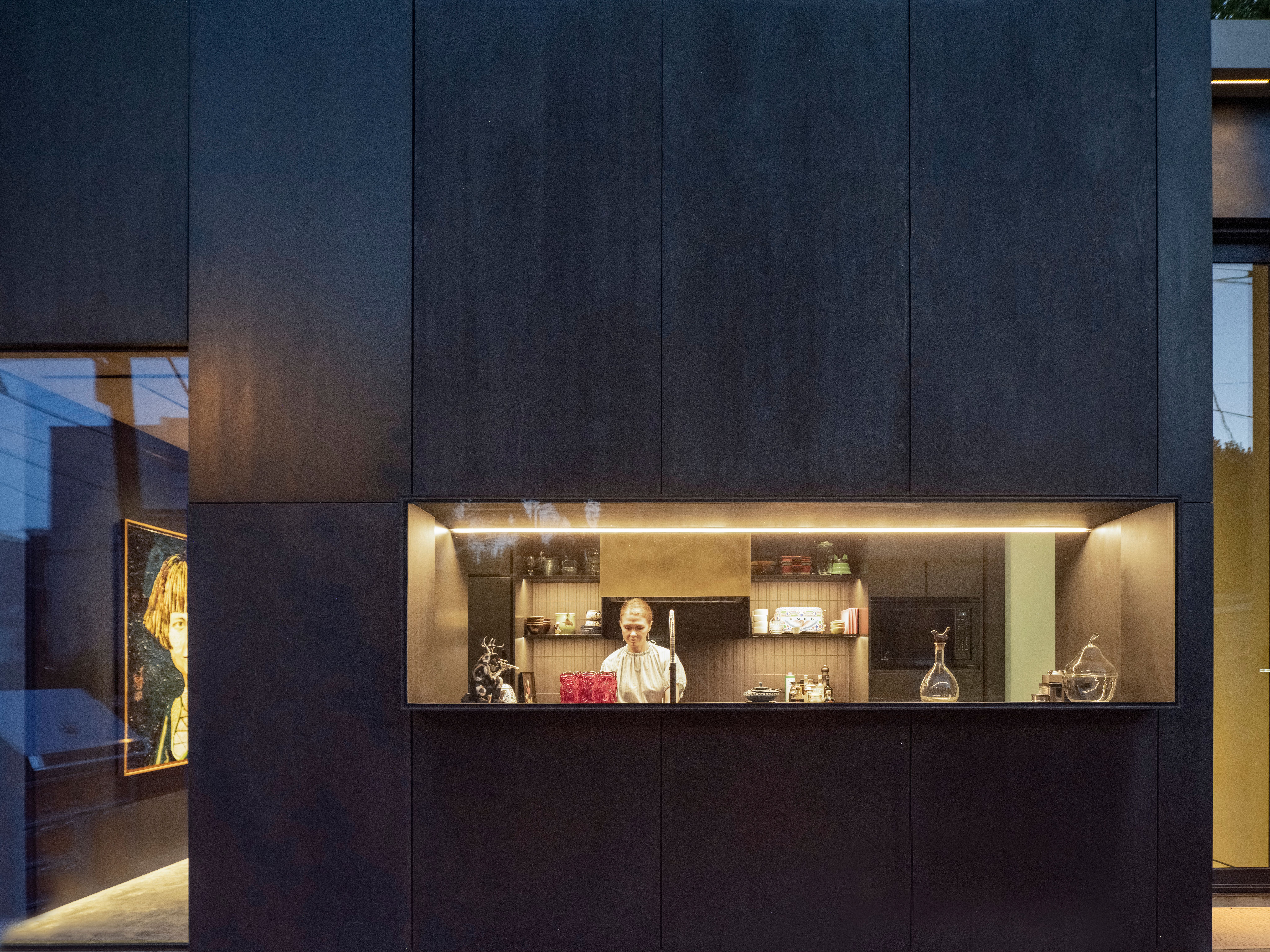 photo of a window on a building and greenery