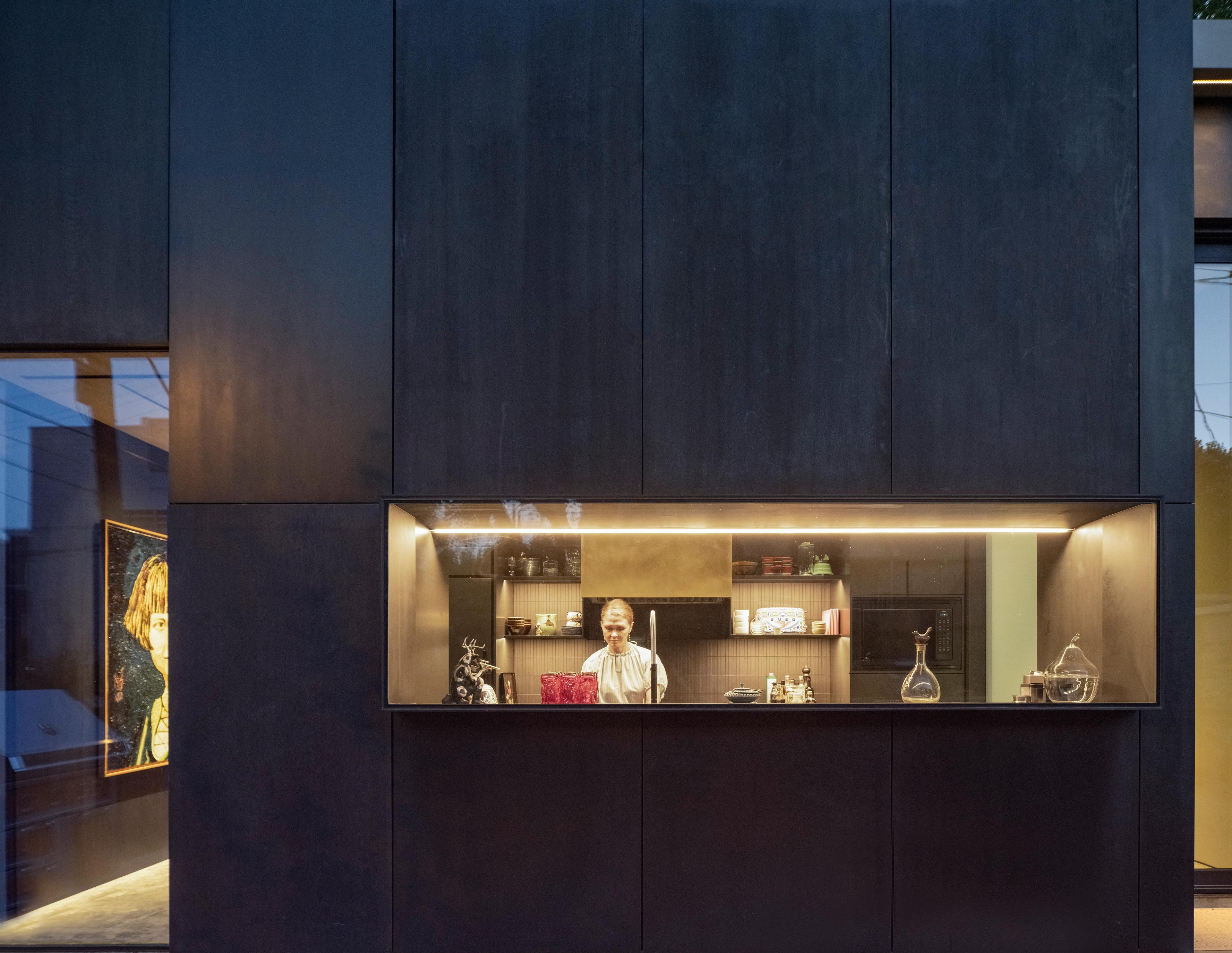 photo of a window on a building and greenery