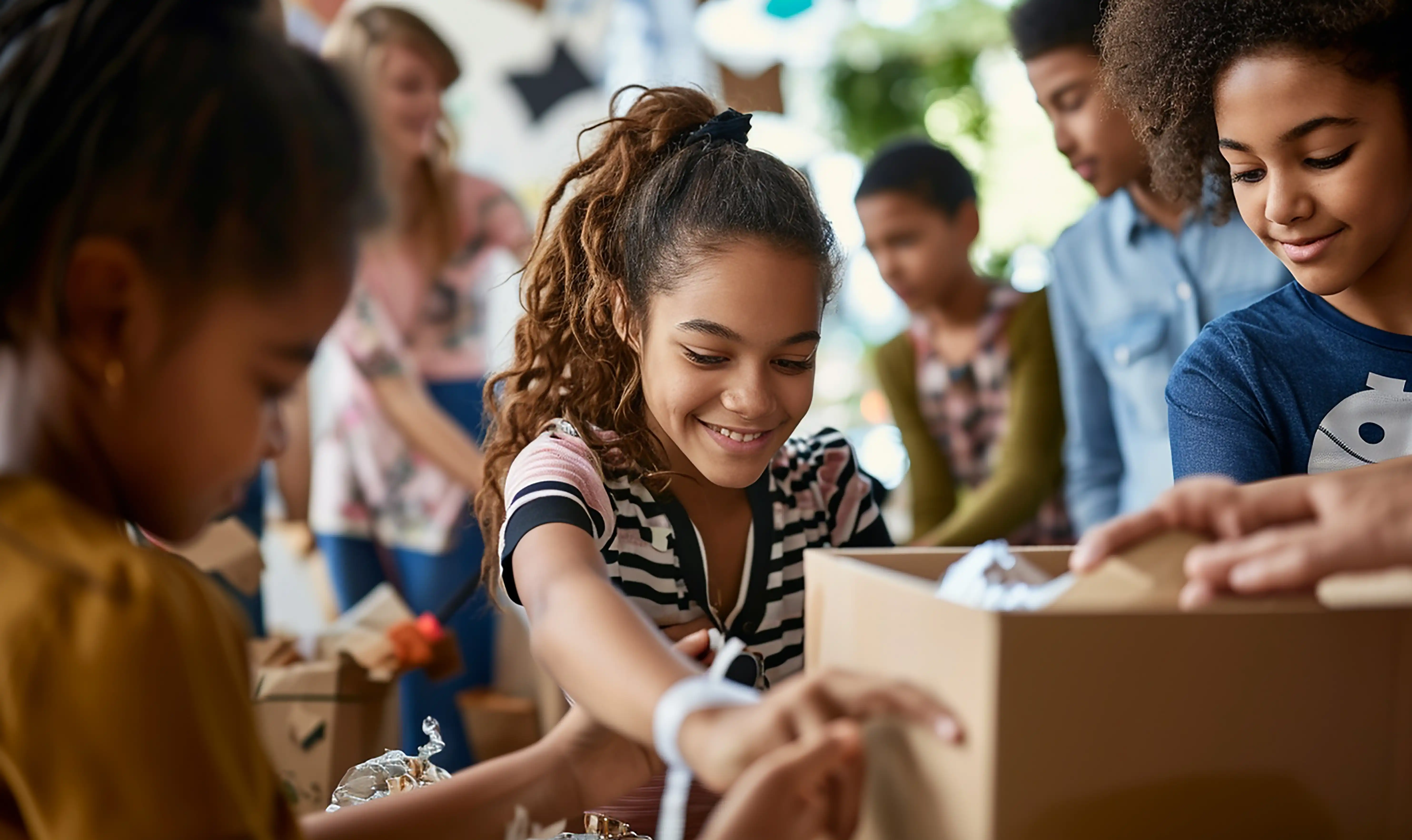 Kids helping volunteer