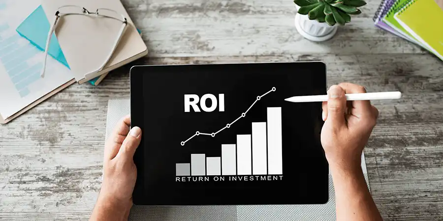 ROI growth chart on a tablet showing return on investment from UX research